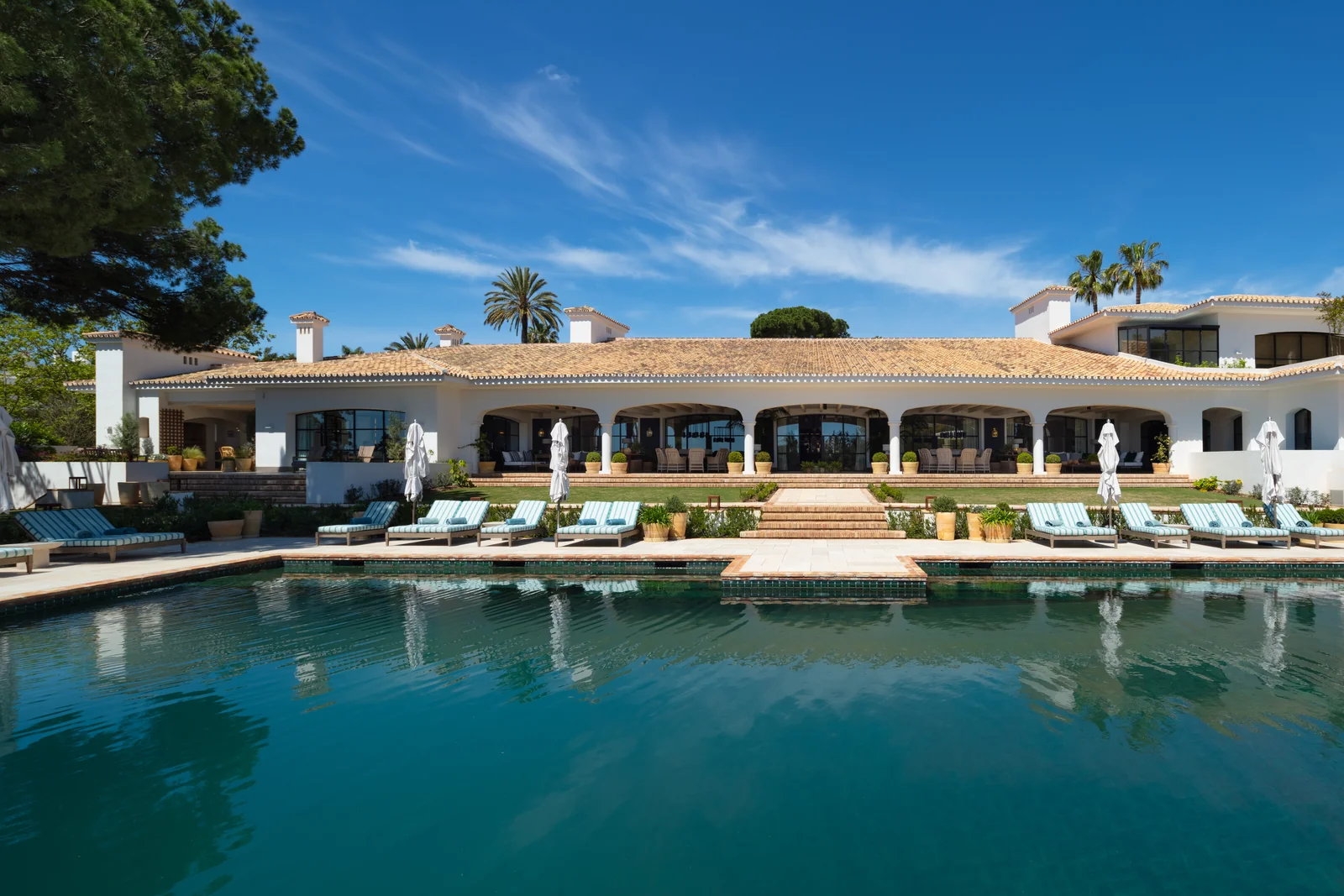 Mediterranean-style villa with large pool and garden