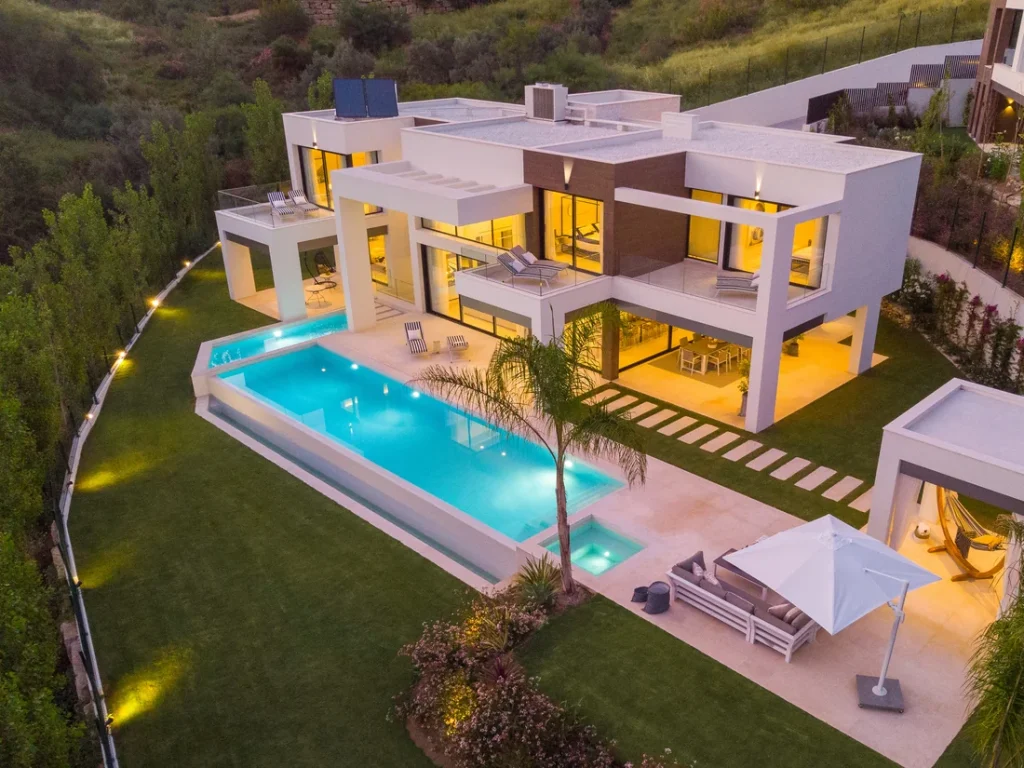 Aerial view of Villa Cerquilla 21 B at dusk